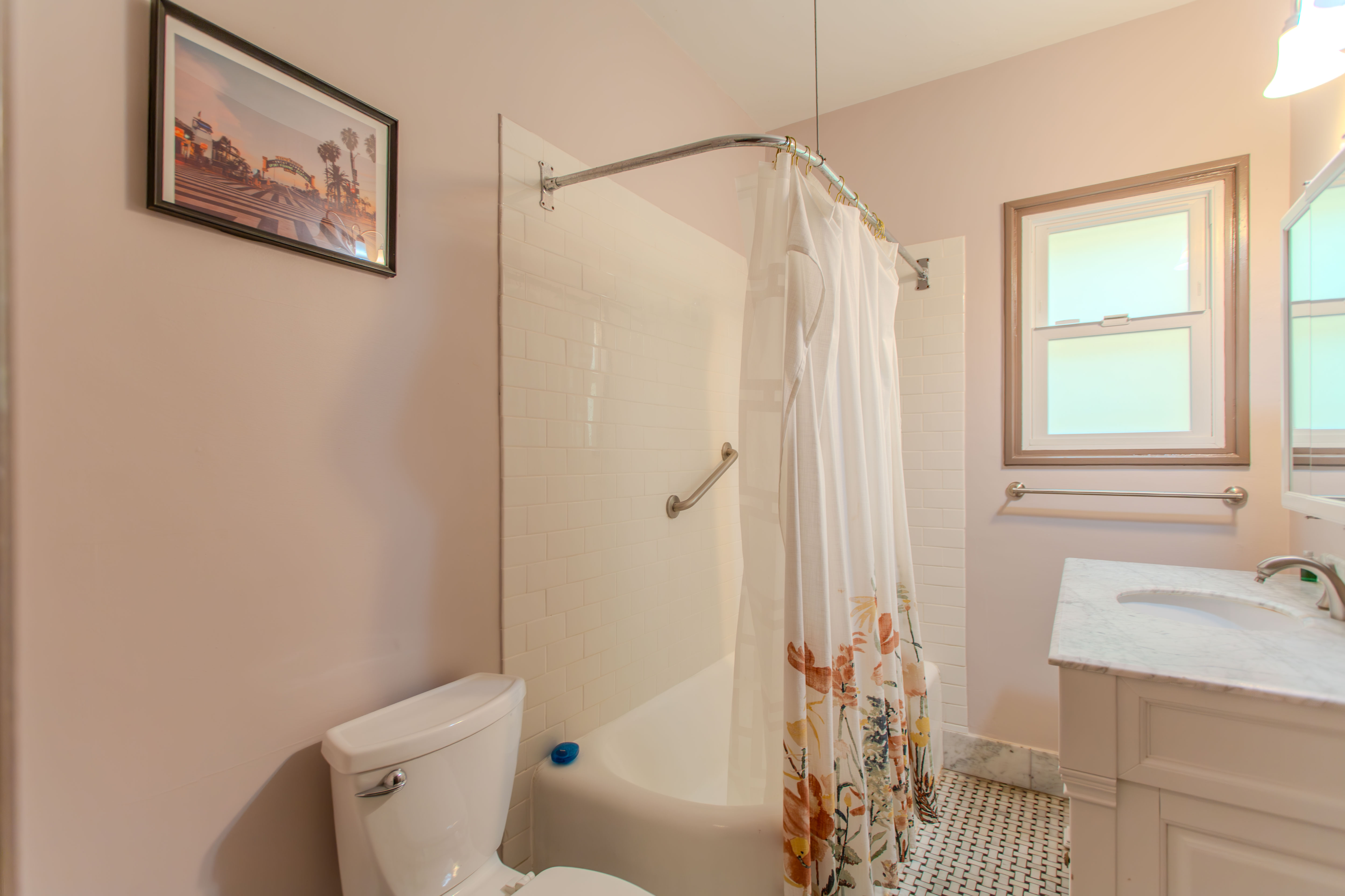 Bathroom with shower and vanity